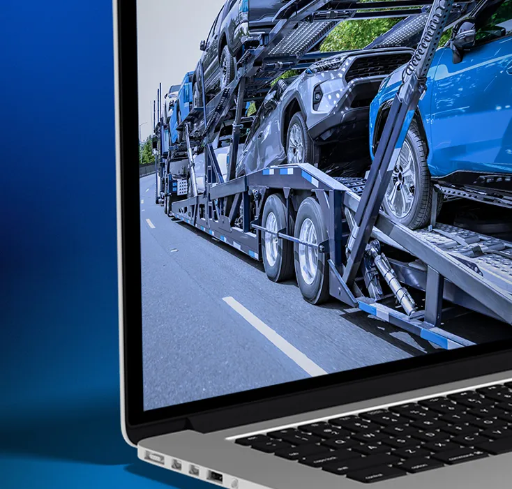 Laptop with car hauler on screen