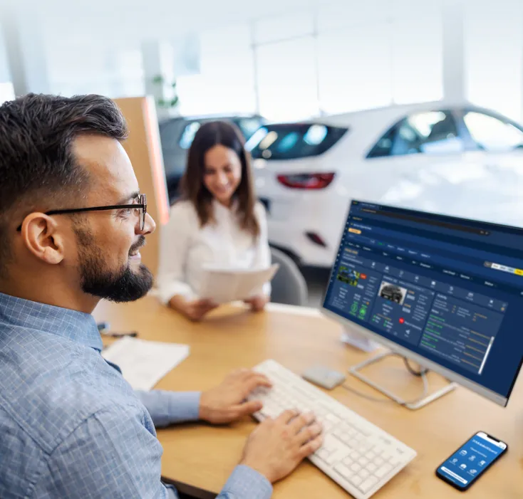 Dealer Wizard People Using Computer